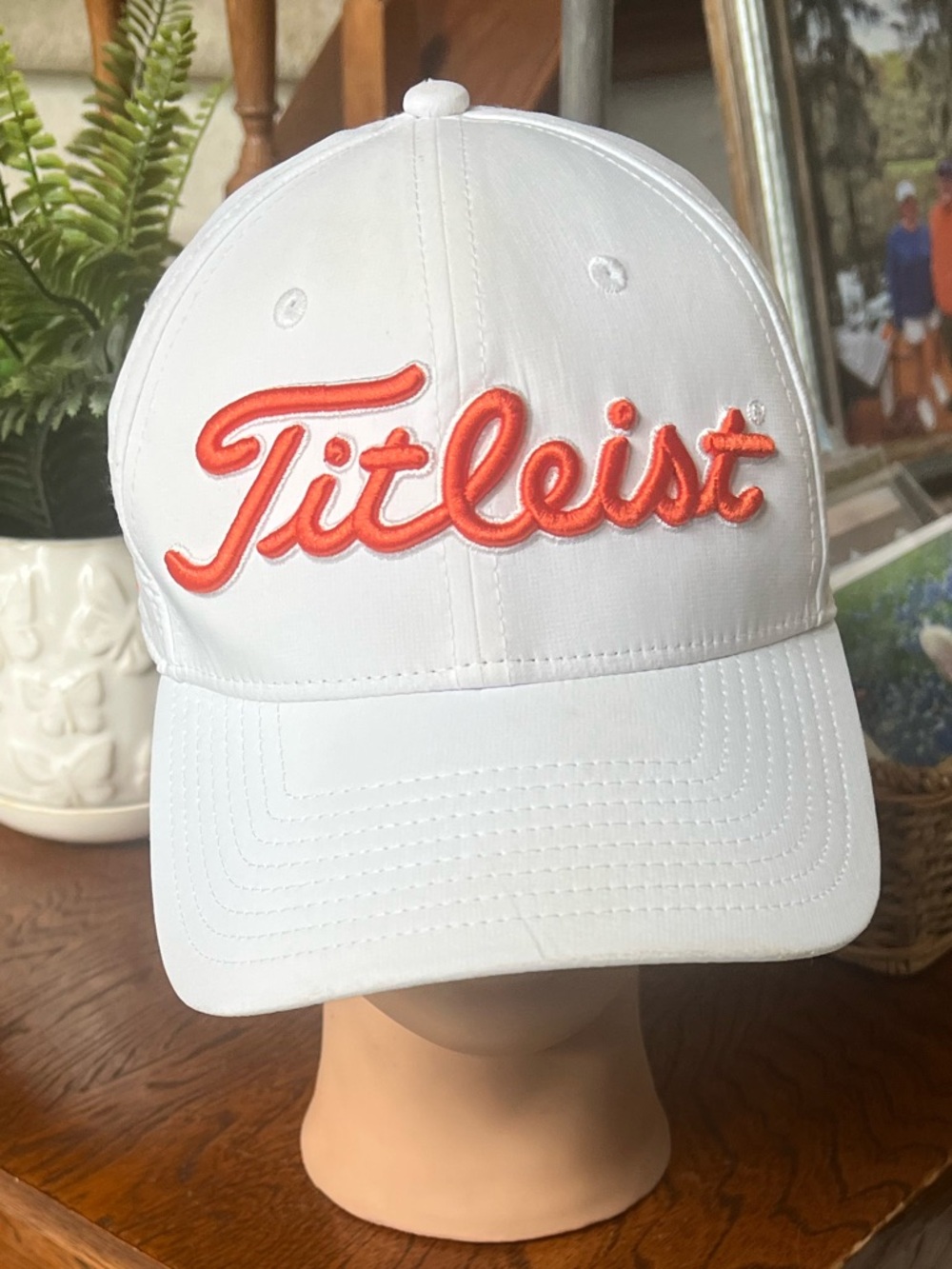 Titleist White Cap with orange Embroidered Logo